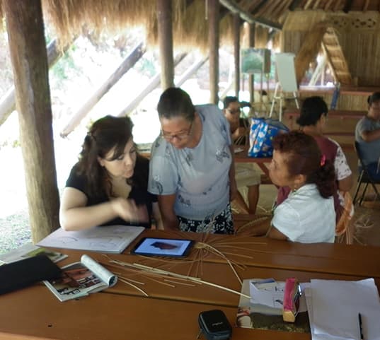 Daniela Viscarra with artisans in Dominica